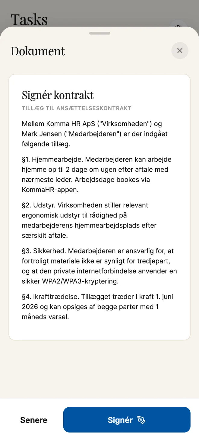 The employment contract addendum open for signature in the Komma app